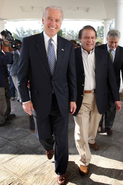 LAHORE, PAKISTAN - FEBRUARY 18:  (FILE) Senator Joseph Biden walks with former Pakistani Prime Minister Nawaz Sharif February 18, 2008 during a visit to Lahore, Pakistan. Barack Obama chose Biden as his Vice Presidential running mate, the Obama campaign announced in a text message early Saturday. Biden is the chairman of the Senate Foreign Relations Committee, and is familiar with foreign leaders and diplomats around the world. Unlike Obama, Biden initially voted to authorize the war in Iraq, although he has been a vocal critic of the Bush Aministration's handling of the war.  (Photo by John Moore/Getty Images)
