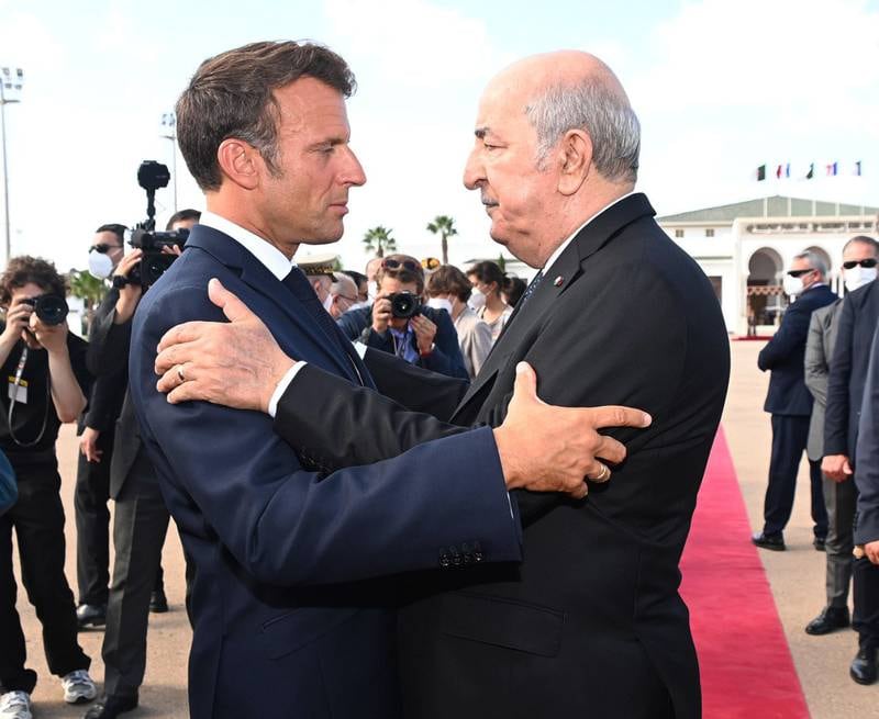 Algerian President Abdelmadjid Tebboune welcomes French President Emmanuel Macron in Algiers on Saturday. EPA