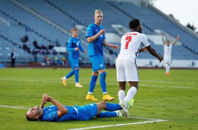 Iceland's Sverrir Ingason on the ground after conceding a penalty. Reuters