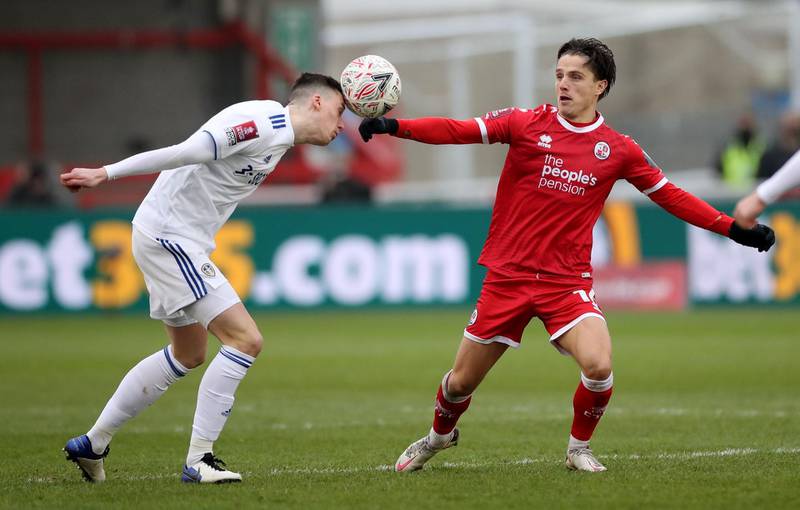 Leeds United's Oliver Casey in action with Crawley Town's Tom Nicholls. Reuters