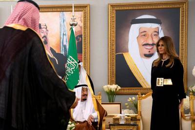 US first lady Melania Trump takes her seat next to Saudi Arabia’s King Salman at the ceremony in the Royal Terminal at King Khalid International Airport in Riyadh. Jonathan Ernst / Reuters