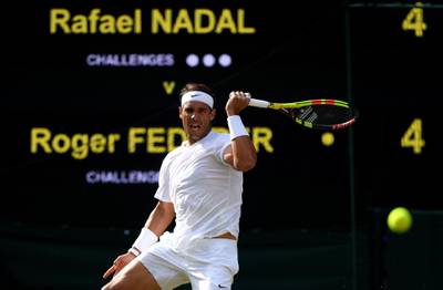 LONDON, ENGLAND - JULY 12: Rafael Nadal of Spain plays a forehand in his Men's Singles semi-final match against Roger Federer of Switzerland during Day eleven of The Championships - Wimbledon 2019 at All England Lawn Tennis and Croquet Club on July 12, 2019 in London, England. (Photo by Shaun Botterill/Getty Images)