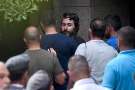 Man who held up Beirut bank still demands savings in full