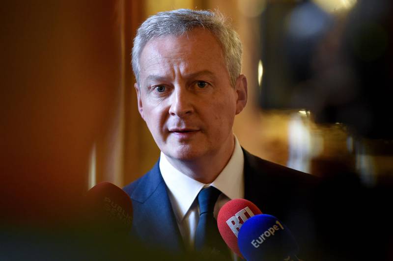 French Finance and Economy Minister Bruno Le Maire talks to journalists at the Senate  in Paris on February 6, 2019 after EU rejected Siemens-Alstom rail merger. / AFP / ERIC PIERMONT
