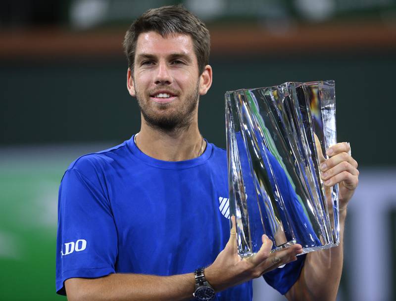 Oct 17, 2021; Indian Wells, CA, USA;  Cameron Norrie (GBR) holds the championship trophy after defeating Nikoloz Basilashvili (GEO) in the men’s final in the BNP Paribas Open at the Indian Wells Tennis Garden.  Mandatory Credit: Jayne Kamin-Oncea-USA TODAY Sports
