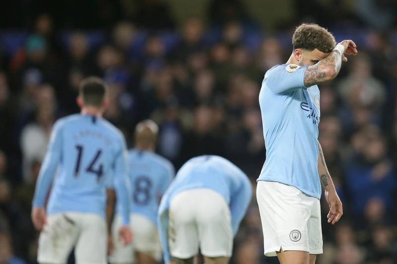 Manchester City's Kyle Walker, right, after the defeat to Chelsea. AP Photo