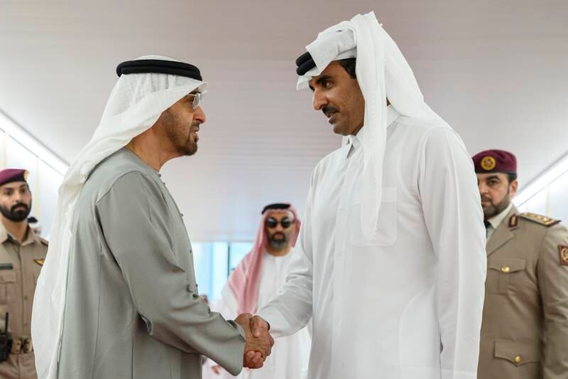 President Sheikh Mohamed bids farewell to Sheikh Tamim before leaving from Hamad International Airport, at the end of his official visit to Qatar. Abdulla Al Neyadi / UAE Presidential Court 