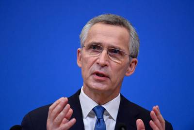 epa09019385 NATO Secretary General Jens Stoltenberg gestures as he addresses a press conference following a virtual meeting of defence ministers at NATO headquarters in Brussels, Belgium, on 17 February 2021.  EPA/JOHN THYS / POOL