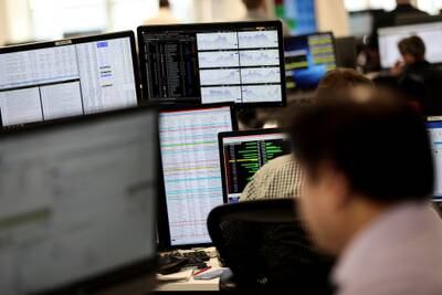 Traders on the IG Index trading floor in London. The British currency has been on a downward trend for a couple of months. Reuters