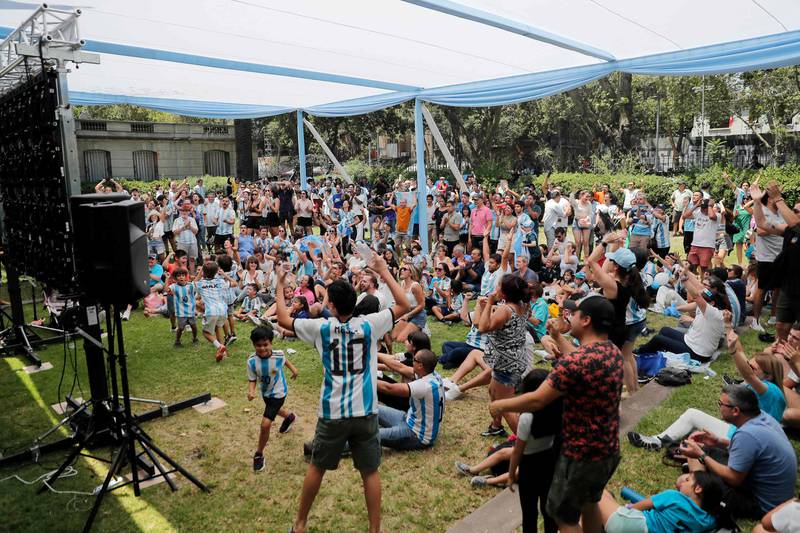 Fans celebrate winning the World Cup at the Argentine embassy in Chile. AFP