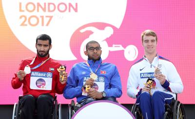 Great Britain's Isaac Towers with his bronze medal (right) with Tunisia's Walid Ktila (centre) and United Arab Emirates' Mohamed Alhammadi after the Men's 800m T34 Final during day eight of the 2017 World Para Athletics Championships at London Stadium. PRESS ASSOCIATION Photo. Picture date: Friday July 21, 2017. See PA story ATHLETICS Para. Photo credit should read: Simon Cooper/PA Wire. RESTRICTIONS: Editorial use only. No transmission of sound or moving images and no video simulation.