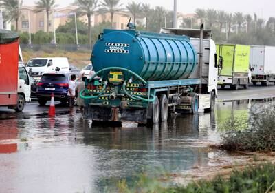 Floodwaters being cleared on Al Qudra Road, Dubai. Chris Whiteoak / The National