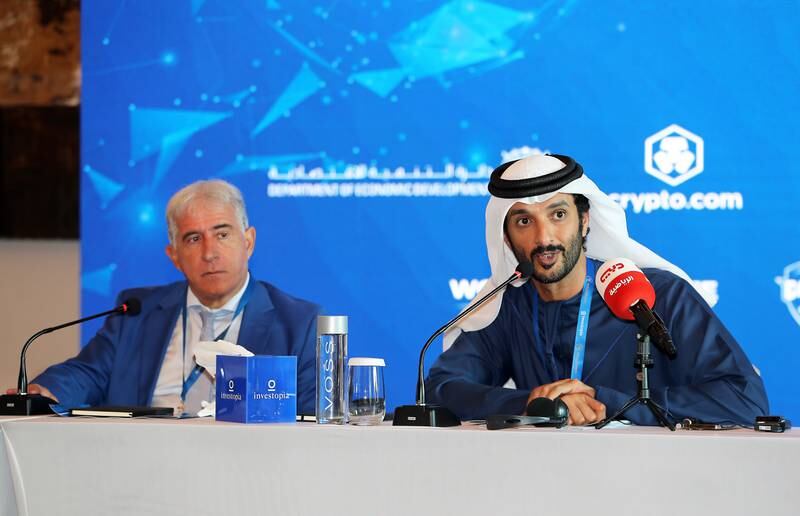 Abdulla bin Touq, Minister of Economy, right, with Bernard Caiazzo, president of the Global Football Alliance, at the Investopia Future of Sport conference in Dubai. Pawan Singh / The National