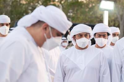 Sheikh Khalifa bin Tahnoon, right, and Sheikh Hamdan bin Zayed at the burial.