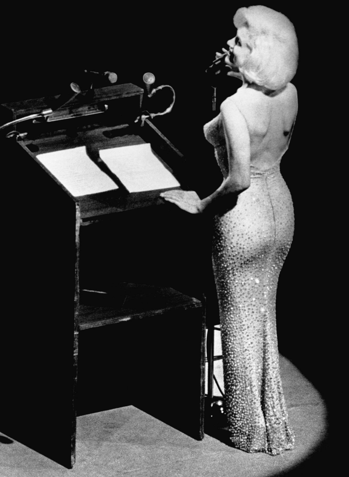 Actress Marilyn Monroe in the dress as she sings 'Happy Birthday' to President John F Kennedy at Madison Square Garden for his 45th birthday in November 1962. Bettmann
