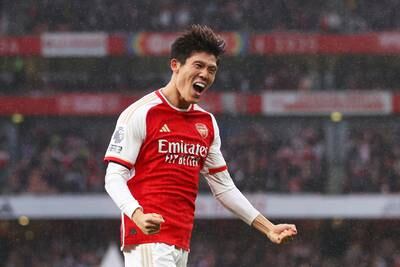 Takehiro Tomiyasu celebrates after scoring Arsenal's final goal. Getty Images