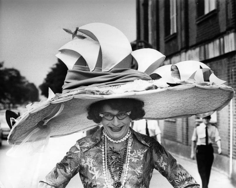 Australian comedian Barry Humphries, dressed as his most famous character Dame Edna Everage, in a hat based on the Sydney Opera House. Getty Images