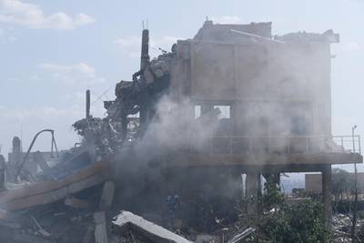 epa06669175 The Scientific Research Center building that was hit by the strikes that were launched on 14 April 2018 by the United States, Britain and France in Barzeh neighborhood in Damascus, Syria, in retaliation for an alleged chemical attackd. The Syrian Information Ministry organized a tour to the center, which the government said was used for pharmaceutical uses.  EPA/YOUSSEF BADAWI