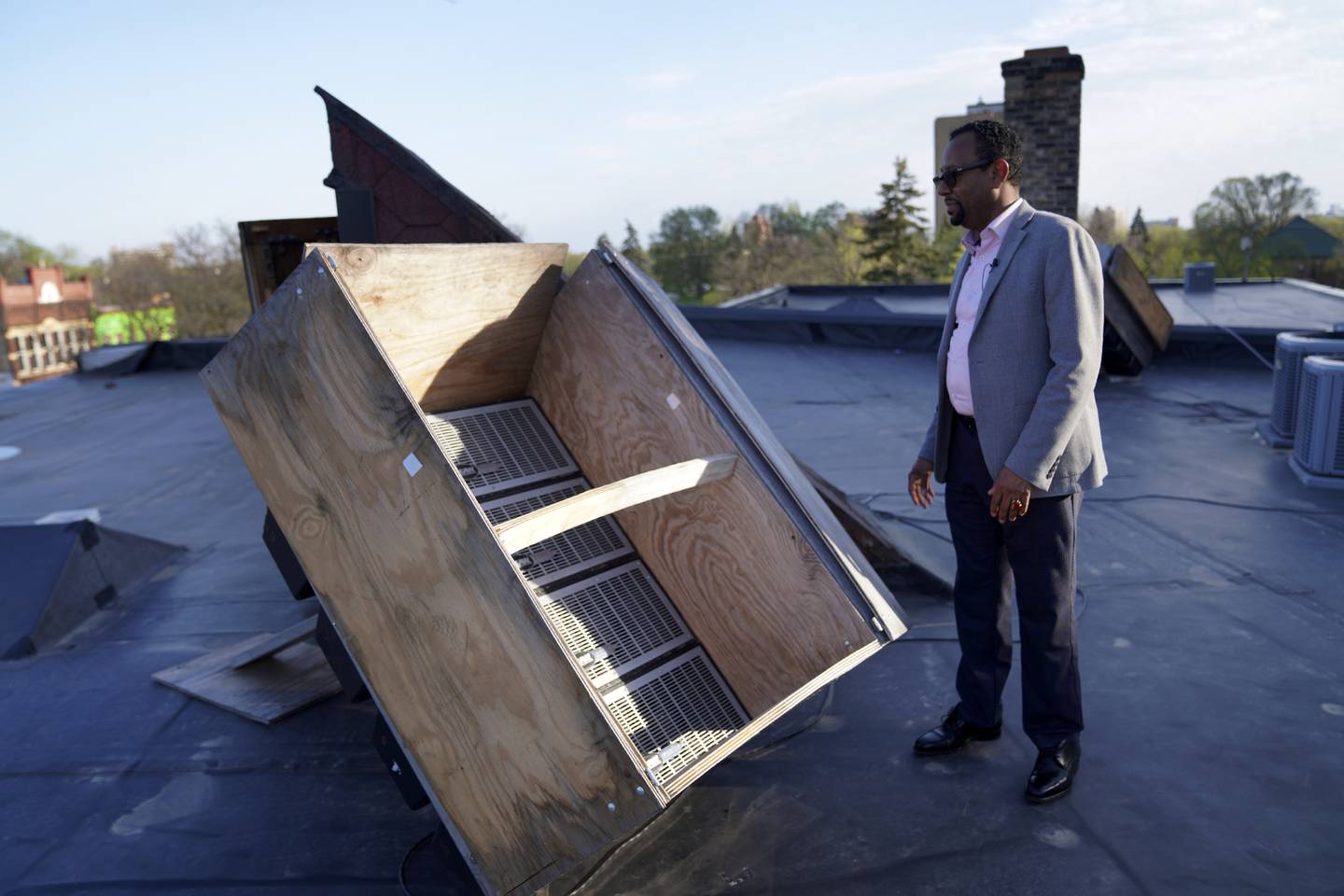 Wali Dirie, executive director of the Islamic Civic Society of America Dar Al-Hijrah mosque, opens rooftop speakers used to publicly broadcast the call to prayer in Minneapolis. AP