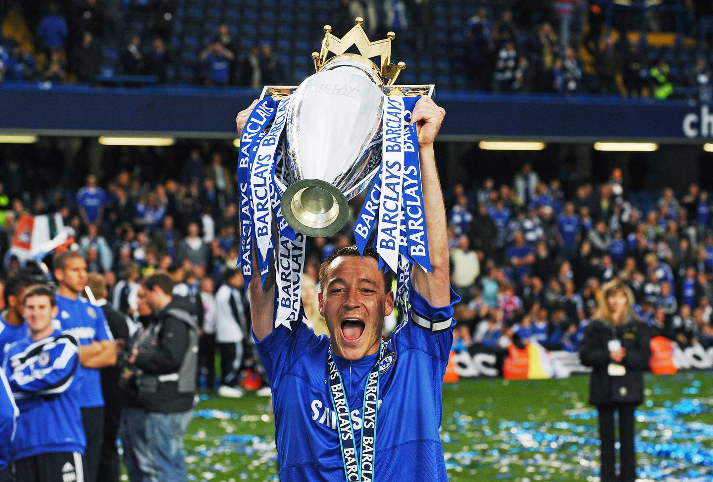 Chelsea's captain John Terry celebrates with the Premier League trophy in 2010. AFP