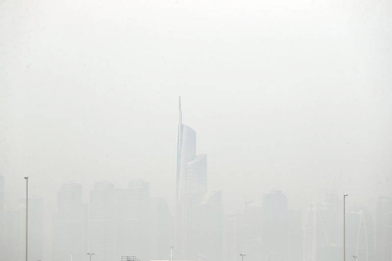 Dubai, United Arab Emirates - Reporter: N/A. News. Weather. The top of Almas Tower can be seen in JLT on a hazy overcast day in Dubai. Tuesday, March 16th, 2021. Dubai. Chris Whiteoak / The National
