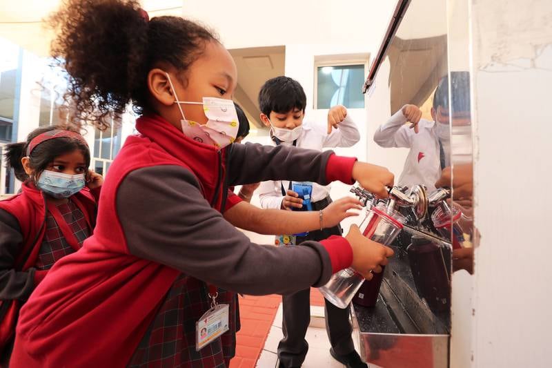 Pupils refilling their bottles from the water fountain at the Gems Legacy School in Dubai. Pawan Singh / The National  Pawan Singh / The National 