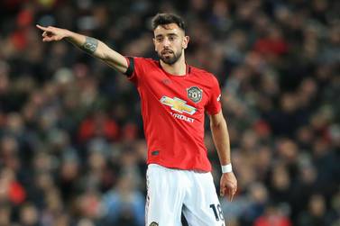 Manchester United's Portuguese midfielder Bruno Fernandes gestures during the English Premier League football match between Manchester United and Wolverhampton Wanderers at Old Trafford in Manchester, north west England, on February 1, 2020. RESTRICTED TO EDITORIAL USE. No use with unauthorized audio, video, data, fixture lists, club/league logos or 'live' services. Online in-match use limited to 120 images. An additional 40 images may be used in extra time. No video emulation. Social media in-match use limited to 120 images. An additional 40 images may be used in extra time. No use in betting publications, games or single club/league/player publications. / AFP / Lindsey Parnaby / RESTRICTED TO EDITORIAL USE. No use with unauthorized audio, video, data, fixture lists, club/league logos or 'live' services. Online in-match use limited to 120 images. An additional 40 images may be used in extra time. No video emulation. Social media in-match use limited to 120 images. An additional 40 images may be used in extra time. No use in betting publications, games or single club/league/player publications.