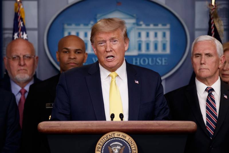 President Donald Trump speaks in the briefing room of the White House in Washington about the coronavirus outbreak, flanked by Dr Robert Redfield, Director of the Centres for Disease Control and Prevention, Surgeon-General Jerome Adams and Vice President Mike Pence, on March 9, 2020. AP Photo