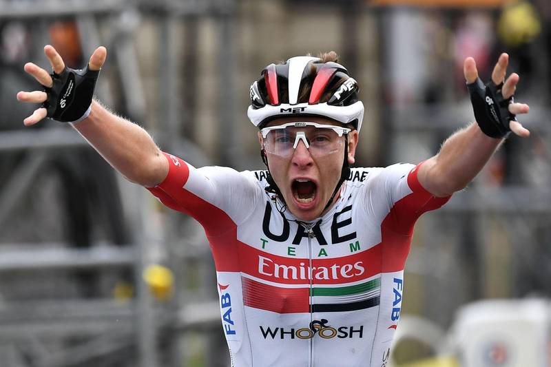 UAE Team Emirates rider Tadej Pogacar celebrates after winning Stage 9 of the Tour de France on Sunday, September 6. AFP