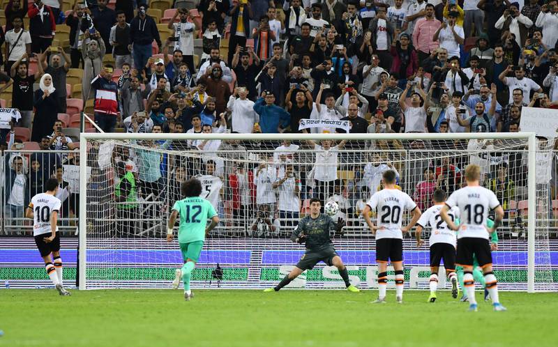 Valencia's Dani Parejo scores their consolation goal from the penalty spot. Reuters
