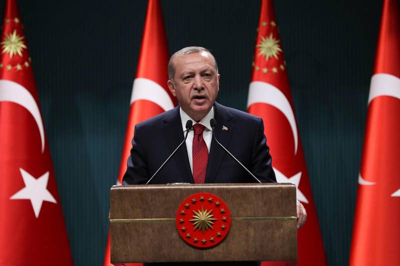 Turkish President Recep Tayyip Erdogan speaks during a press conference at the Presidential Complex in Ankara, on April 18, 2018.
President Recep Tayyip Erdogan on April 18, 2018 called snap elections in Turkey for June 24, bringing the polls forward by over a year-and-a-half after a call from his main nationalist ally. Both presidential and parliamentary elections will be held on the same day. They had originally been scheduled for November 3, 2019.
 / AFP PHOTO / ADEM ALTAN