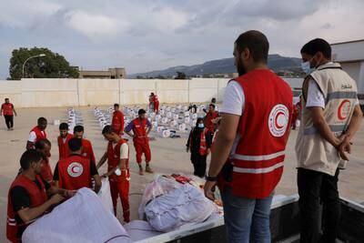 Aid and relief items are delivered by the Emirates Red Crescent to Karsa. Reuters