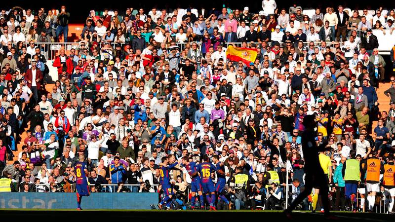 MADRID, SPAIN - DECEMBER 23: Fans look on in the sunshine during the La Liga match between Real Madrid and Barcelona at Estadio Santiago Bernabeu on December 23, 2017 in Madrid, Spain.  (Photo by Gonzalo Arroyo Moreno/Getty Images)
