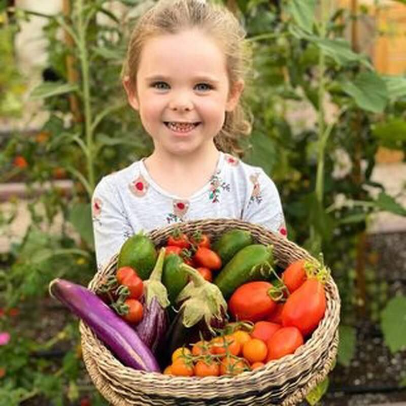 Amirah loves harvesting and popping the vegetables straight into her mouth. Photo: amirah.and.jamies.garden / Instagram