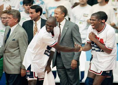 USA's Magic Johnson, right, and Michael Jordan shake hands near the end of their win over Croatia in the gold medal game in men's basketball match at the Summer Olympics in Barcelona. AP