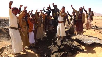 A still from a Houthi rebel video shows Yemenis cheering at the site. AFP