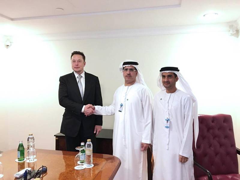 Saeed Al Tayer, centre, the chief executive of the Dubai Electricity and Water Authority, discussed future cooperation opportunities with Elon Musk, the chief executive of Tesla, left. At right is Waleed Salman, the executive vice president of strategy and business development at Dewa. Courtesy Dewa