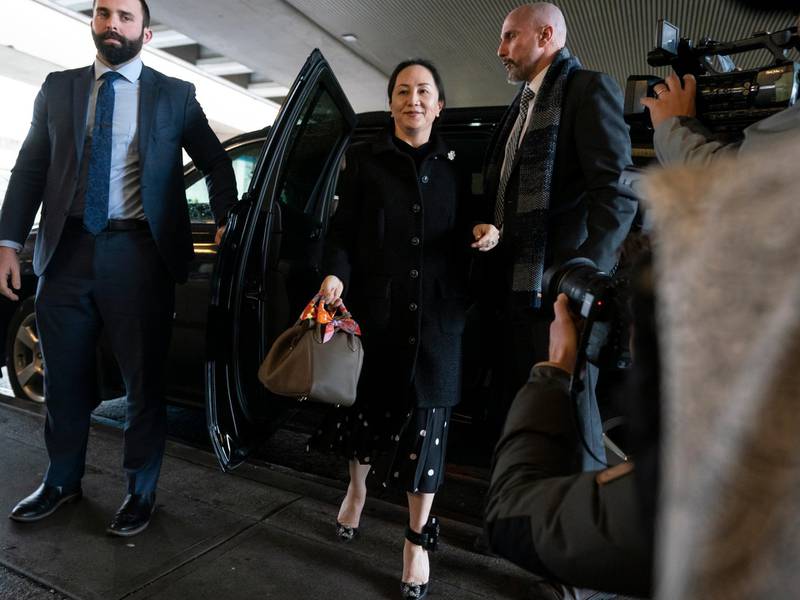 epa08145660 Meng Wanzhou steps out of her car upon arriving at BC Supreme Court in Vancouver, British Columbia, Canada 20 January 2020. The United States is seeking extradition of Meng since she was detained in December 2018 on charges related to accusations that Huawei had tried to steal US technology and had lied about its relationship with an Iranian subsidiary.  EPA/Stringer