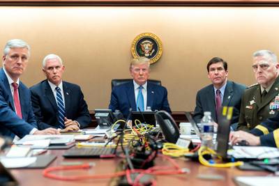 US President Donald Trump is joined by Vice President Mike Pence, second from left, National Security Adviser Robert O’Brien, left; Secretary of Defense Mark Esper, second from right,  and Chairman of the Joint Chiefs of Staff Army Gen. Mark A. Milley, right in the Situation Room of the White House monitoring developments as US special forces closed in on Abu Bakr Al Baghdadi's compound in Syria. White House via AP