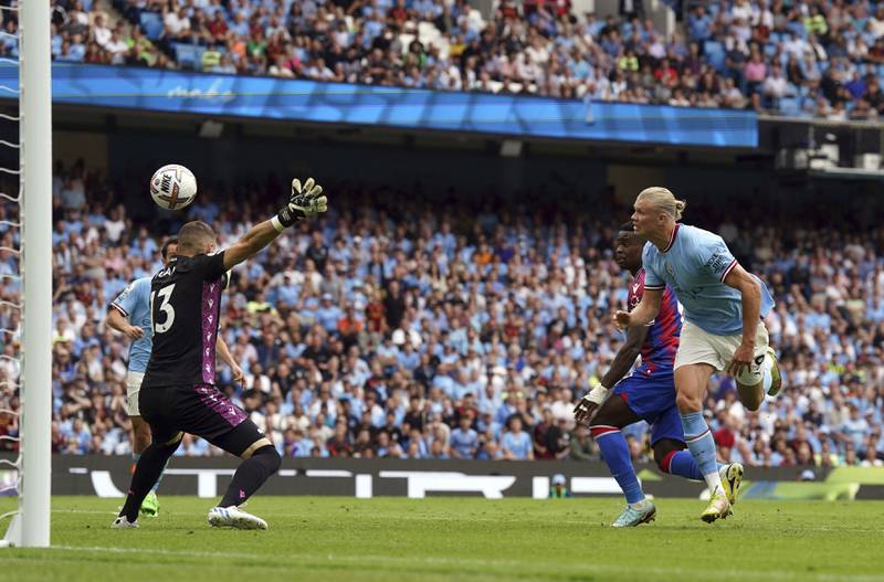 Manchester City's Erling Haaland scores against Crystal Palace. AP