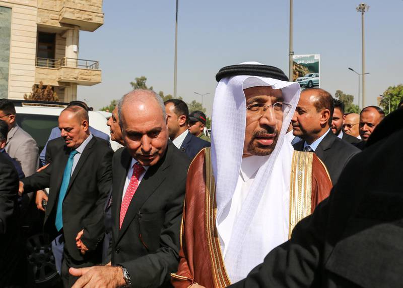 Saudi Energy Minister Khalid al-Falih (C-R) arrives to attend the opening of the Baghdad International Fair on October 21, 2017. / AFP PHOTO / SABAH ARAR