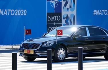Turkey's President Recep Tayyip Erdogan arrives for a Nato summit in Brussels. He adopted a conciliatory tone before a meeting with US President Joe Biden. AP