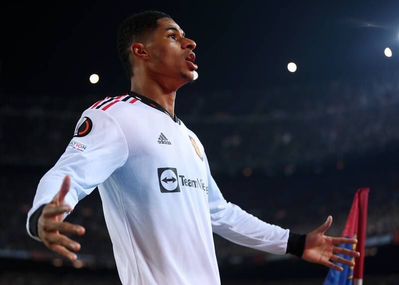 Marcus Rashford celebrates after Jules Kounde's own goal puts Manchester United 2-1 in front in the 2-2 Europa League play-off first leg draw against Barcelona at Camp Nou on February 16, 2023. Getty