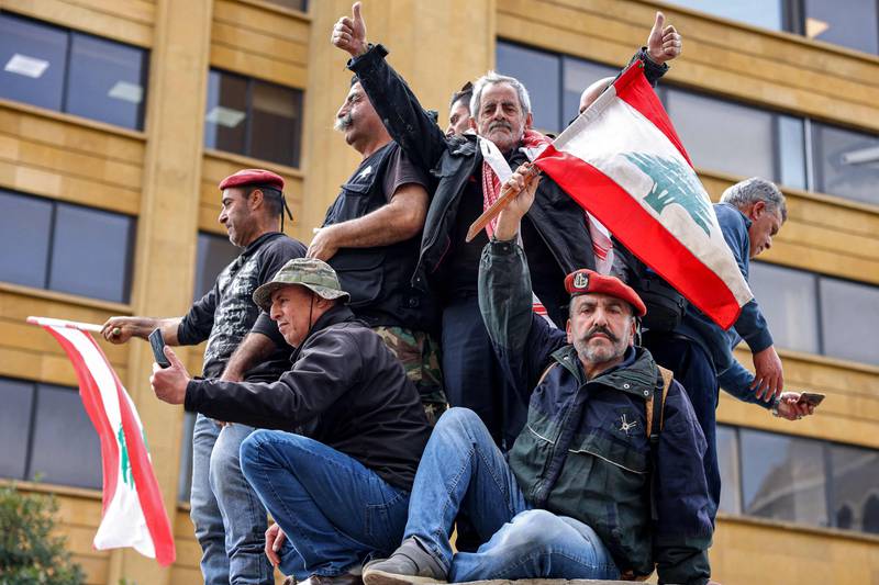 Protesters outside the government palace in Beirut. AFP