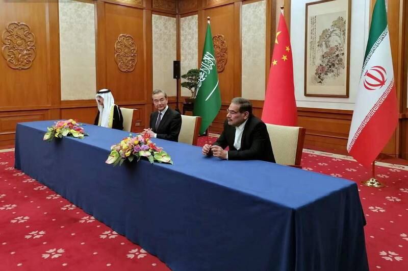 From left, Saudi national security adviser Musaad Al Aiban, Chinese diplomat Wang Yi and Iran’s Supreme National Security Council secretary Ali Shamkhani. AP