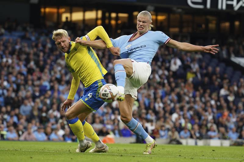 Manchester City's Erling Haaland scores the opening goal at the Etihad. AP