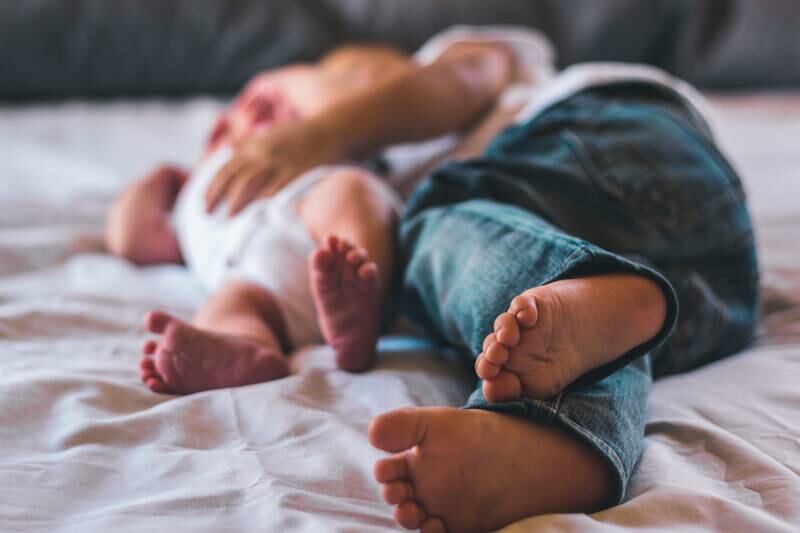 The choice to co-sleep may be cultural or personal, and varies from family to family. Photo: Isaac Del Toro / Unsplash
