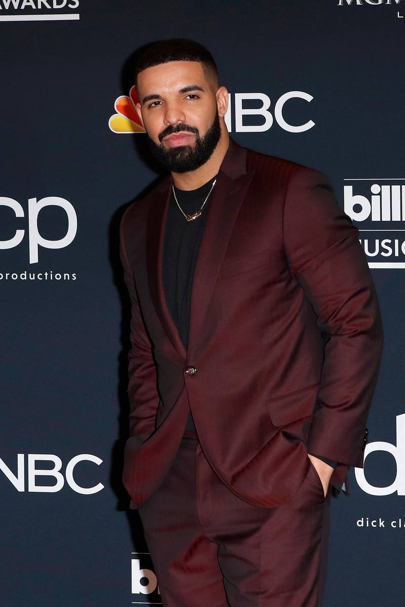 epa07541789 Drake poses in the press room at the 2019 Billboard Music Awards at the MGM Grand Garden Arena in Las Vegas, Nevada, USA, 01 May 2019. The Billboard Music Awards finalists are based on US year-end chart performance, sales, number of downloads and total airplay.  EPA-EFE/NINA PROMMER