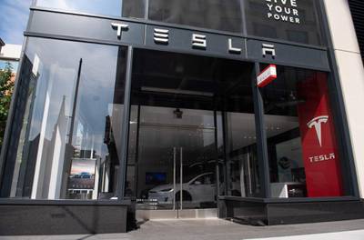 A Tesla showroom is seen in Washington, DC, on August 8, 2018. - Tesla's board of directors said Wednesday it will evaluate chief executive Elon Musk's proposal to take the electric car maker private. After Musk last week raised the idea as a better solution for Tesla's long-term growth, directors met "several times" and are "taking the appropriate next steps to evaluate this," the board said in a brief statement issued before the stock market opened. (Photo by SAUL LOEB / AFP)