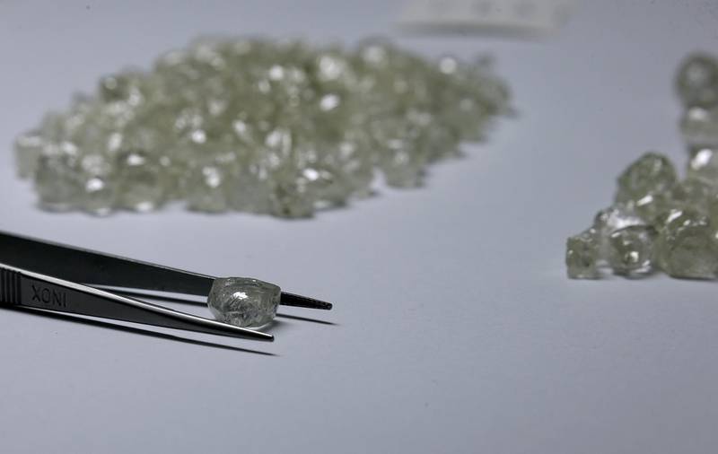 FILE PHOTO: Diamonds are displayed during a visit to the De Beers Global Sightholder Sales (GSS) in Gaborone, Botswana November 24, 2015.  REUTERS/Siphiwe Sibeko/File Photo